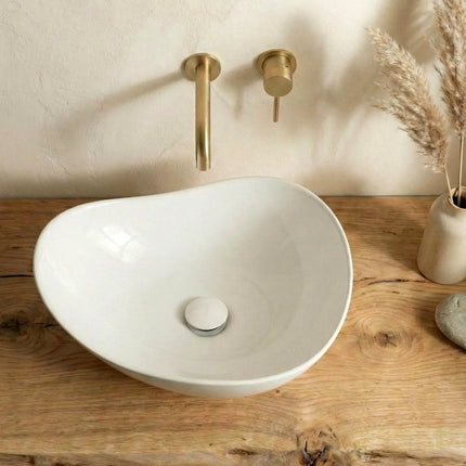 Lavoar ceramic pe blat A710 alb lucios, formă atipică – vedere laterală
